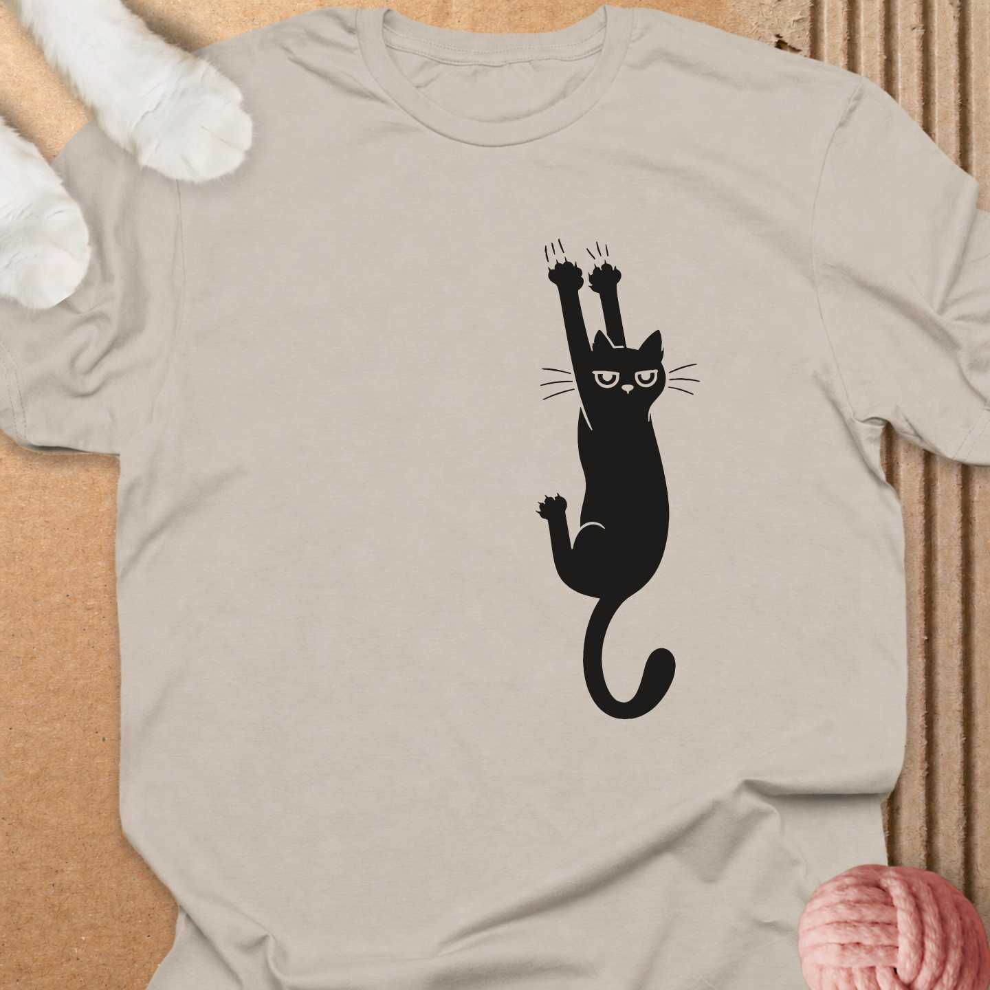 Cat Holding On